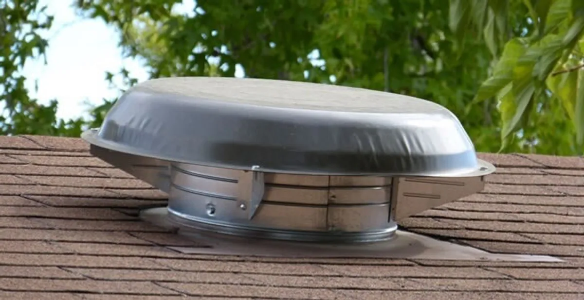 attic fan installation services with low-profile roof ventilation unit in Escondido, CA