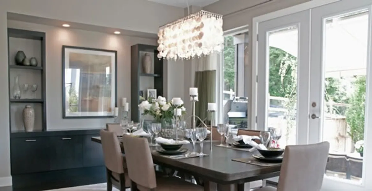 Elegant dining room chandelier installation above table in Escondido, CA