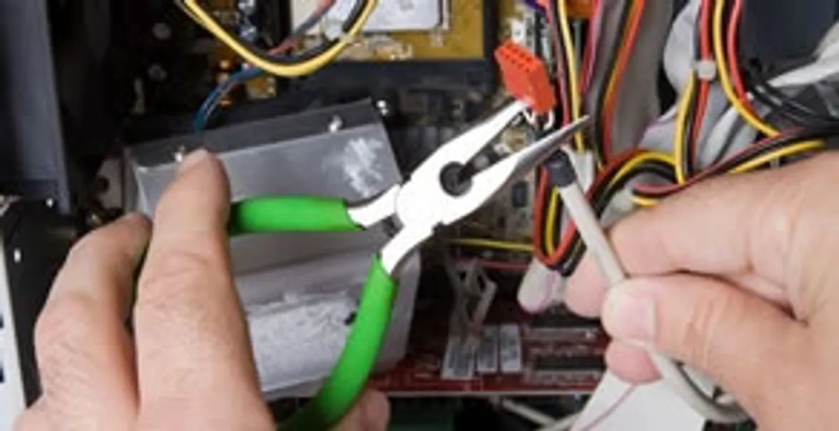 Licensed electrical contractor performing electrical repair with tools in Santee, CA