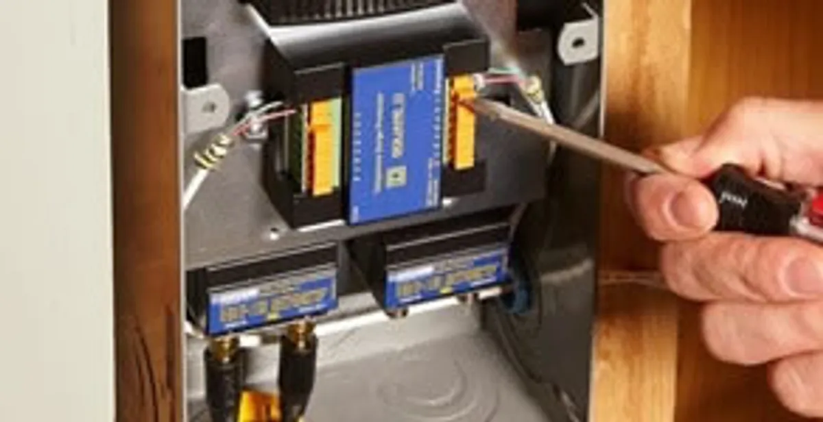 Whole home surge protection device being installed by a licensed electrician to protect electrical systems in Escondido, CA